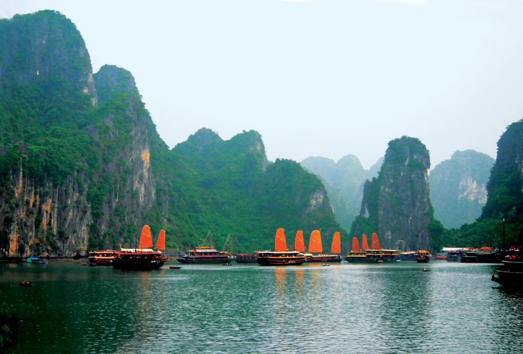 Parade of colorful boats on Ha Long Bay